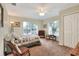 Inviting bedroom with a ceiling fan, closet, and natural light at 1218 Lake Point Ter, Lakeland, FL 33813
