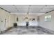 Spacious two-car garage with plenty of room for storage, tools, and projects at 1218 Lake Point Ter, Lakeland, FL 33813
