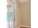 Easy access to private pool via glass paned door at 1218 Lake Point Ter, Lakeland, FL 33813