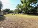 Spacious backyard offers plenty of space for outdoor activities and relaxation at 135 E Columbia St, Lake Alfred, FL 33850
