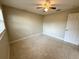 Bedroom featuring natural light from the window and a ceiling fan at 135 E Columbia St, Lake Alfred, FL 33850