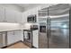 Modern kitchen featuring stainless steel appliances, sleek countertops, and ample cabinet space at 1415 S Lincoln Ave, Lakeland, FL 33803