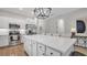 Spacious kitchen featuring a large island, modern appliances, ample cabinet space, and sleek countertops at 1415 S Lincoln Ave, Lakeland, FL 33803