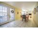 Inviting dining area with access to an outdoor patio, featuring a charming table setting at 16 Golfview Ne Cir, Winter Haven, FL 33881