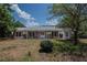 Charming brick home with a well-maintained lawn and mature trees in a Gathering-friendly neighborhood at 16 Golfview Ne Cir, Winter Haven, FL 33881