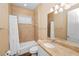 Well-lit bathroom featuring a granite vanity, tiled shower, and bathtub with coordinated fixtures at 1772 Laurel Glen Pl, Lakeland, FL 33803