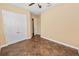 Spacious bedroom featuring a closet and tile floors at 1772 Laurel Glen Pl, Lakeland, FL 33803