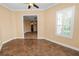 Bonus room with natural light and an open doorway leading to other parts of the house at 1772 Laurel Glen Pl, Lakeland, FL 33803