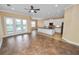 Spacious eat-in kitchen with white cabinets, dark appliances, tile floors, and lots of natural light at 1772 Laurel Glen Pl, Lakeland, FL 33803