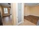 This kitchen offers a decorative pantry door, granite countertops, and stainless steel appliances at 1772 Laurel Glen Pl, Lakeland, FL 33803
