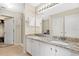 Bathroom with double sinks, granite countertops, and vanity at 1837 Farrington Dr, Lakeland, FL 33809
