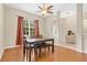 Inviting dining room featuring a wooden table, chairs, and large window at 1837 Farrington Dr, Lakeland, FL 33809