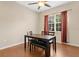 Bright dining area with a wooden table, chairs, and ample natural light at 1837 Farrington Dr, Lakeland, FL 33809