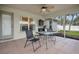 Covered patio with ceiling fan and outdoor seating, perfect for relaxing and entertaining at 1837 Farrington Dr, Lakeland, FL 33809