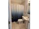 Cozy bathroom with shower/tub and pedestal sink at 200 S Goodman Ave, Lake Alfred, FL 33850
