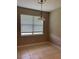 Bright dining area featuring tile floors, pendant lighting and a large window at 200 S Goodman Ave, Lake Alfred, FL 33850