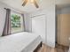 Cozy bedroom with closet and window view at 209 W Crescent Dr, Lakeland, FL 33805
