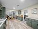 Open kitchen with views to the dining room and living room at 209 W Crescent Dr, Lakeland, FL 33805