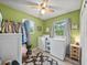Laundry room featuring a washer and dryer, plus storage space at 209 W Crescent Dr, Lakeland, FL 33805