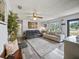 Comfortable living room with couches and hardwood flooring at 209 W Crescent Dr, Lakeland, FL 33805