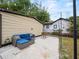 Cozy outdoor patio area with comfortable seating and string lights for evening ambiance at 209 W Crescent Dr, Lakeland, FL 33805
