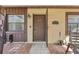 Inviting front entrance featuring a quaint sitting area and covered parking at 2173 Castle Pt, Winter Haven, FL 33880
