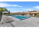 Community pool with sun loungers offering a relaxing spot in the community to socialize at 2173 Castle Pt, Winter Haven, FL 33880