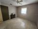 Modest bedroom with single window, ceiling fan, and closet at 220 Pinehurst Dr, Auburndale, FL 33823
