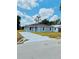 Charming single-story home with a long driveway and newly landscaped front yard at 2220 W Lanier St, Lakeland, FL 33815