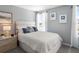 Serene bedroom featuring a plush bed, soft lighting, and stylish decor with a calming color palette at 230 Turtle Bay Ave, Winter Haven, FL 33881