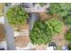 Aerial view of a home with trees and a driveway at 236 Hillside Dr, Lakeland, FL 33803