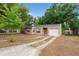 Single-story home offers convenient parking with an attached single car garage at 236 Hillside Dr, Lakeland, FL 33803