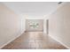 Bright living room featuring neutral walls and tiled flooring at 236 Hillside Dr, Lakeland, FL 33803