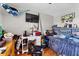 Bedroom with ceiling fan, tv, desk, and wood flooring at 2500 Brooke Rd, Fort Meade, FL 33841