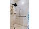 Shower featuring a shower head, grab bars and tiled walls at 2500 Brooke Rd, Fort Meade, FL 33841