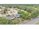 The aerial view shows a suburban neighborhood with a mix of housing styles and tree-lined streets at 2526 Fabry Cir, Orlando, FL 32817