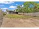 Large backyard with ample space and a screened-in patio, ideal for recreation and enjoying the outdoors at 2526 Fabry Cir, Orlando, FL 32817