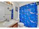 Bathroom with a shark-themed shower curtain and modern fixtures at 2526 Fabry Cir, Orlando, FL 32817