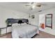 Relaxing bedroom with leafy headboard and an en-suite bathroom at 2526 Fabry Cir, Orlando, FL 32817
