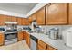 Functional kitchen with stainless steel appliances and ample counter space for cooking at 2526 Fabry Cir, Orlando, FL 32817