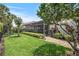 Tranquil backyard view with a screened lanai area that overlooks the home's lovely green space at 2569 Laurel Glen Dr, Lakeland, FL 33803