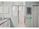 Bathroom featuring a shower, granite countertop vanity, and neutral decor at 2569 Laurel Glen Dr, Lakeland, FL 33803