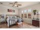 Charming bedroom with soft natural light, plush bedding, and coordinated decor at 2569 Laurel Glen Dr, Lakeland, FL 33803
