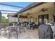 Inviting covered patio with stylish furniture and ceiling fans, perfect for outdoor dining and relaxation at 2569 Laurel Glen Dr, Lakeland, FL 33803