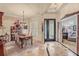 Formal dining room showcasing custom window shutters and an elegant light fixture at 2569 Laurel Glen Dr, Lakeland, FL 33803