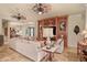 View of the living room with tile floors, decor, and custom wood entertainment center at 2569 Laurel Glen Dr, Lakeland, FL 33803