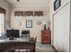 Home office featuring a spacious desk, comfortable chair, and wood cabinets, providing a functional workspace at 2569 Laurel Glen Dr, Lakeland, FL 33803