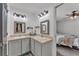 Well-lit bathroom with dual vanities, providing ample space and a convenient layout at 2700 Oak Hammock Loop, Mulberry, FL 33860