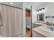 Functional bathroom with dual sinks, modern fixtures, and a convenient shower, providing practicality at 2700 Oak Hammock Loop, Mulberry, FL 33860