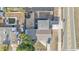Birds eye view of a home's backyard, including a pool, trampoline and storage container at 2705 N Martha Ave, Lakeland, FL 33805
